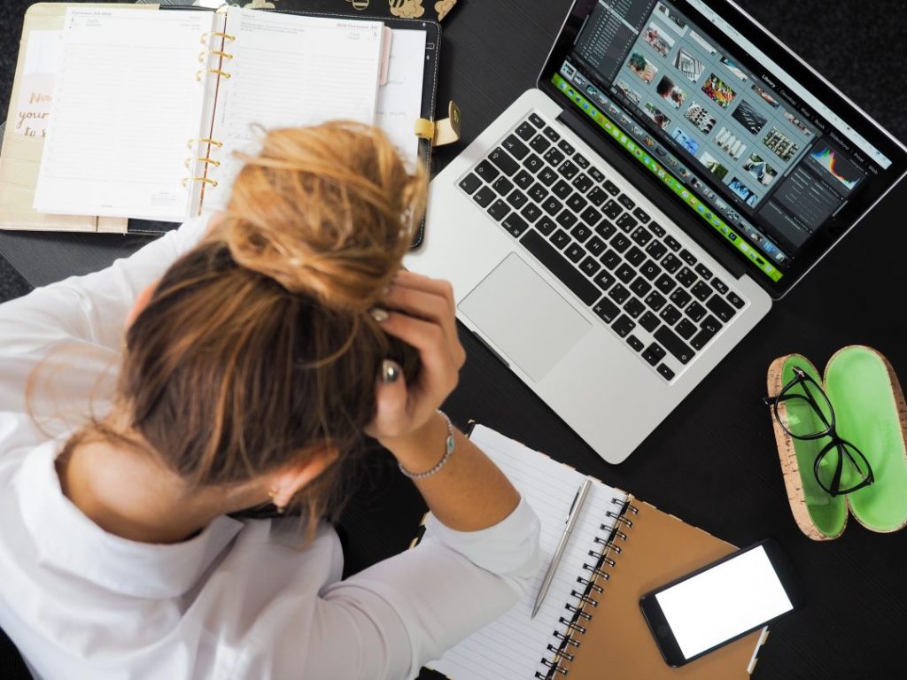 Women working in front of a laptop